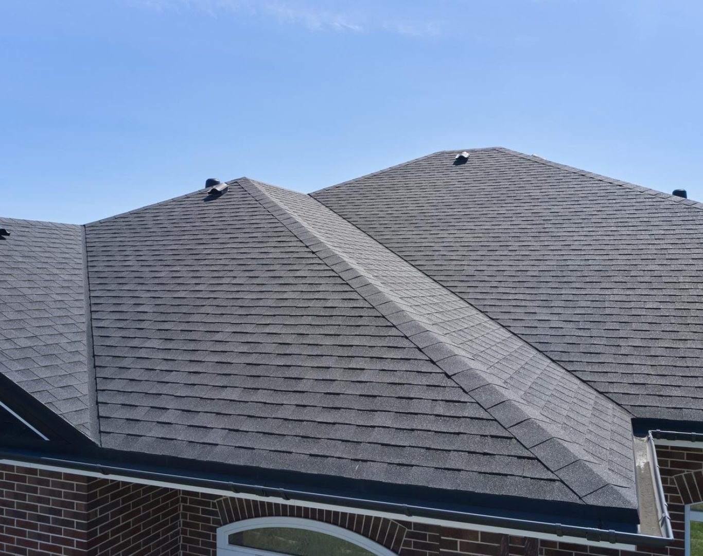 Skilled crew performing roof repair in Manlius, NY